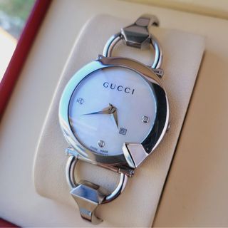 Preowned GUCCI Chiodo w/ 3 pt. Diamond White Mother of Pearl Dial Watch