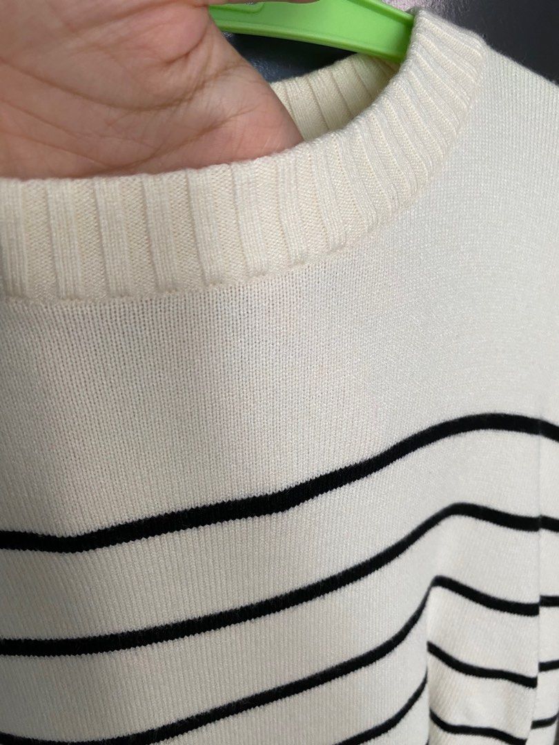 Shein Striped Black and Cream Sweater (Category: Longsleeves) located in Taguig. Submitted by postjoonie (Listing ID 1309222152, Image 2). Description: worn once for a trip! fabric is nice and soft, keeps the warmth but not too hot on the skin. can fit S-M. wore Uniqlo heattech underneath and it still fit well! :) (for reference i am a size XS-S) .