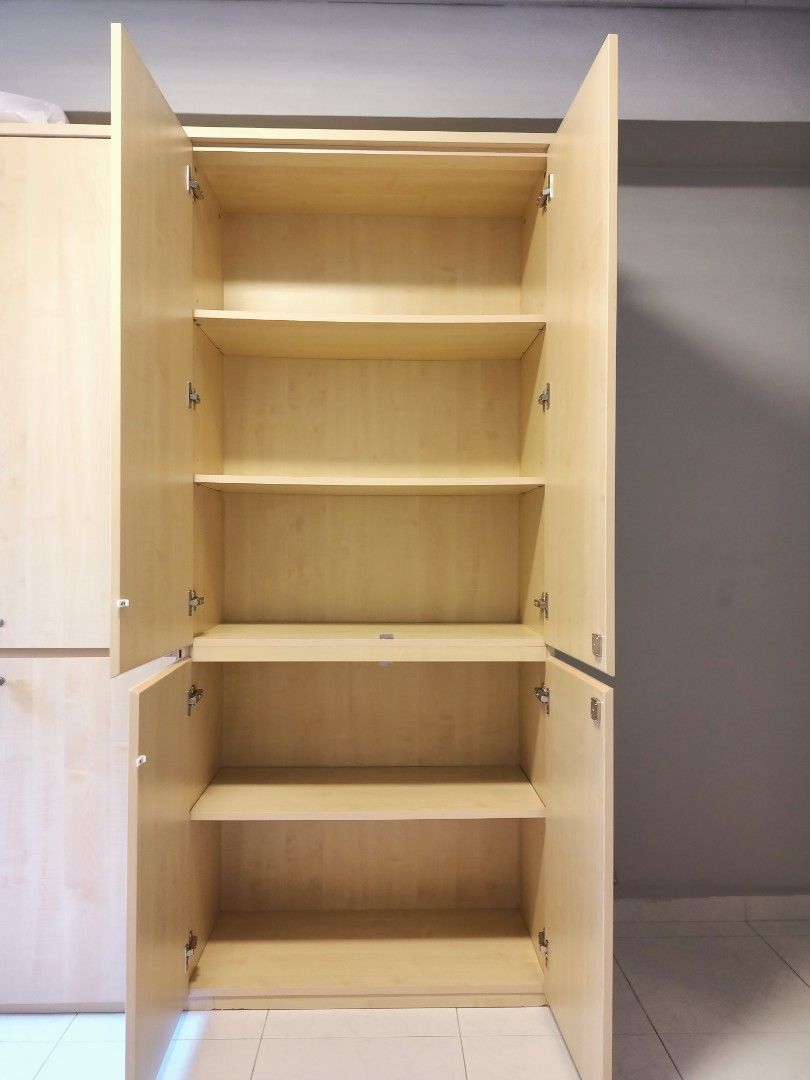 Solid customize cabinet (Category: Shelves, Cabinets & Racks) located in Singapore. Submitted by colonelyun (Listing ID 1309355044, Image 1). Description: HT 206 x L90 x W44 cm each piece customized made $500 each $100 each, it looks very neat sturdy study table $12.