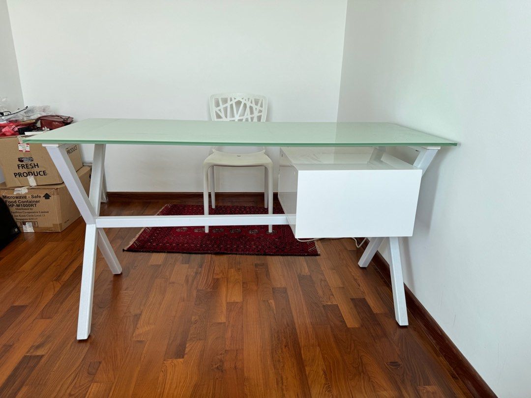 Study Table (Category: Tables & Sets) located in Singapore. Submitted by kiritvj (Listing ID 1309191010, Image 3). Description: Italian design Tempered glass Good condition 2 floating drawers .