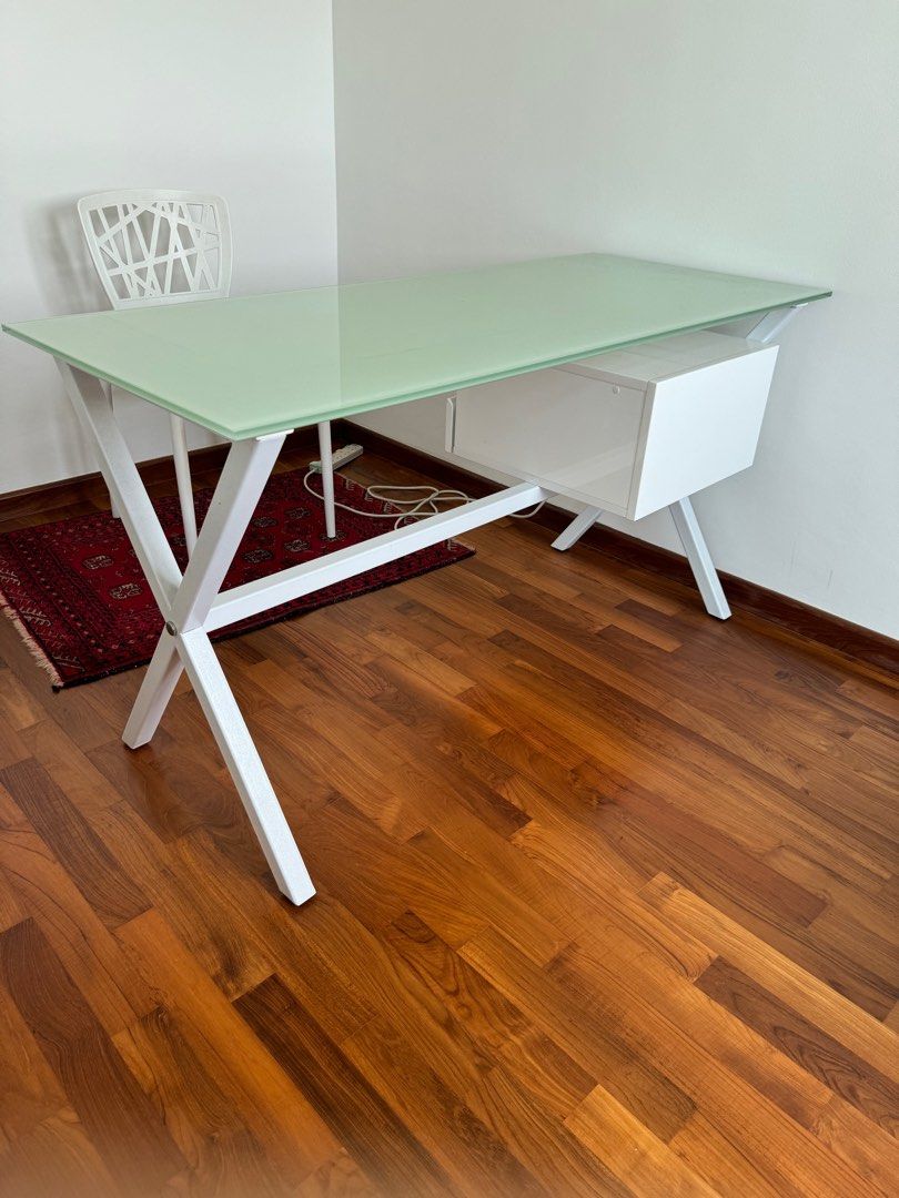 Study Table (Category: Tables & Sets) located in Singapore. Submitted by kiritvj (Listing ID 1309191010, Image 2). Description: Italian design Tempered glass Good condition 2 floating drawers .