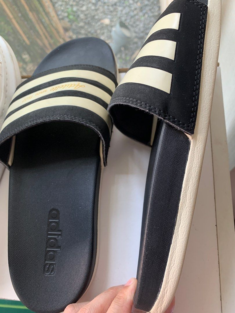 Adidas Adilette Comfort Slides Black (Category: Slippers & Slides) located in Taguig. Submitted by mid20springcleaners (Listing ID 1309380449, Image 2). Description: Adidas Adilette Comfort Slides Black with White / Gold ✅ Size US 9 Mens ✅ Comfortable cushion ✅ Great condition, no issues ✅ Original, bought from Adidas online.
