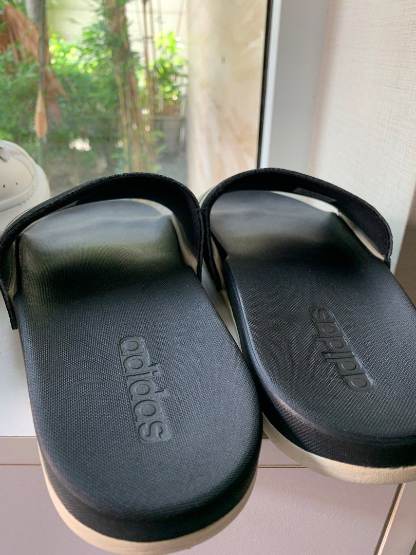 Adidas Adilette Comfort Slides Black (Category: Slippers & Slides) located in Taguig. Submitted by mid20springcleaners (Listing ID 1309380449, Image 3). Description: Adidas Adilette Comfort Slides Black with White / Gold ✅ Size US 9 Mens ✅ Comfortable cushion ✅ Great condition, no issues ✅ Original, bought from Adidas online.