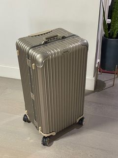 Authentic Rimowa luggage in Gold