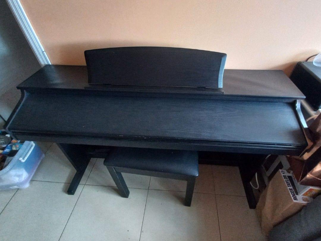 Caviar piano TG8852 (Category: Musical Instruments) located in Pasay City. Submitted by movingout_lowprices (Listing ID 1309367388, Image 1). Description: humidity damage, vinyl is peeling from frame, minor scratches. Semi weighted keys. Sound has no issues, can plug in headphones. piano bench included. price negotiable..