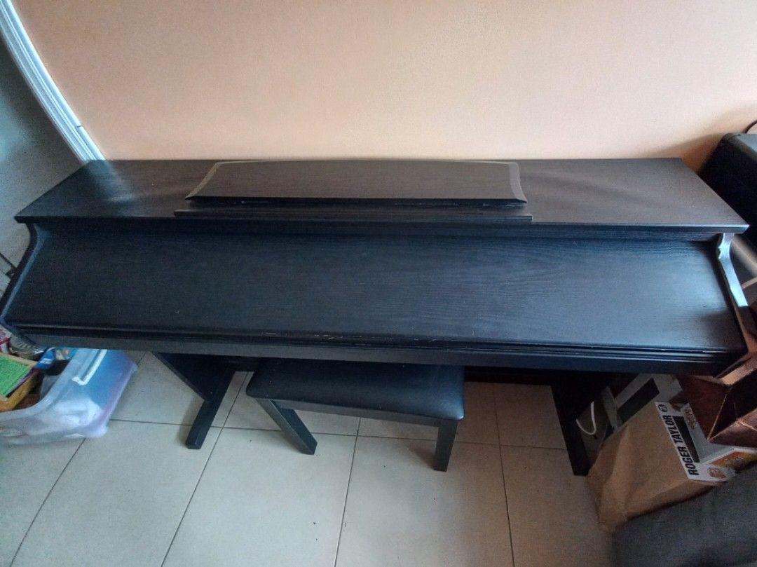 Caviar piano TG8852 (Category: Musical Instruments) located in Pasay City. Submitted by movingout_lowprices (Listing ID 1309367388, Image 3). Description: humidity damage, vinyl is peeling from frame, minor scratches. Semi weighted keys. Sound has no issues, can plug in headphones. piano bench included. price negotiable..