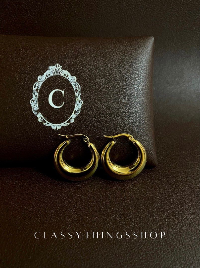 Chunky Gold Hoop Earrings (Category: Earrings) located in Quezon City. Submitted by classythingsshop (Listing ID 1309481246, Image 1). Description: Chunky Gold Hoop Earrings. Actual photo of the item. [Swipe to the last slide for the when worn photo] Material: Stainless steel. All our items are high quality, nontarnish and hypoallergenic. Feel free to inquire anytime through our chat or use the number below as intended. Thank you!.
