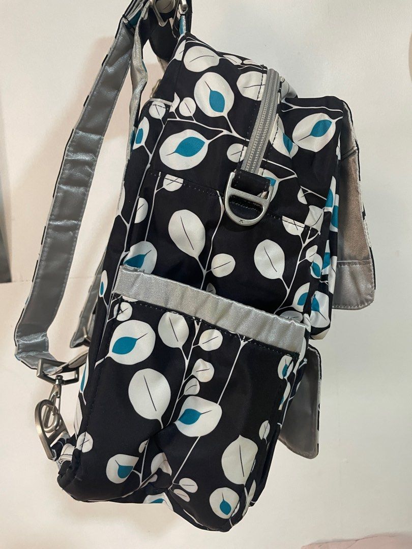 JUJUBE Diaper Backpack (Multipockets) (Category: Diaper Bags & Wetbags) located in Manila. Submitted by gshopcollectibles (Listing ID 1309379707, Image 3). Description: Rarely used In good condition Perfect when going out Backpack/Hand bag/Body Bag/Shoulder bag Kindly click the photos to zoom in .