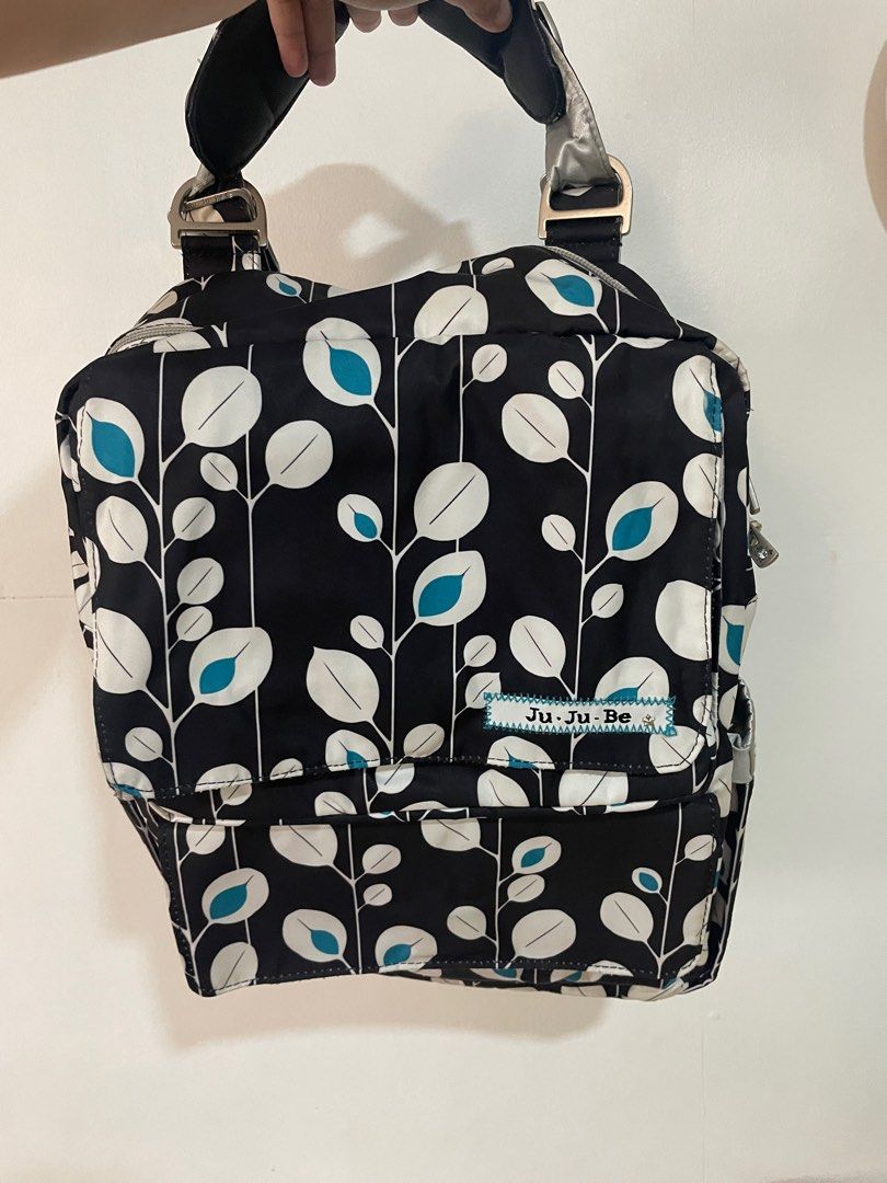 JUJUBE Diaper Backpack (Multipockets) (Category: Diaper Bags & Wetbags) located in Manila. Submitted by gshopcollectibles (Listing ID 1309379707, Image 1). Description: Rarely used In good condition Perfect when going out Backpack/Hand bag/Body Bag/Shoulder bag Kindly click the photos to zoom in .
