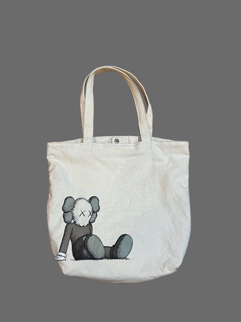 Kaws x Uniqlo Tote bag (Category: Tote Bags) located in Las Pinas. Submitted by mcscloset (Listing ID 1309494943, Image 1). Description: Kaws x Uniqlo Tote bag Lightly used/just stored Purchased from uniqlo 900.
