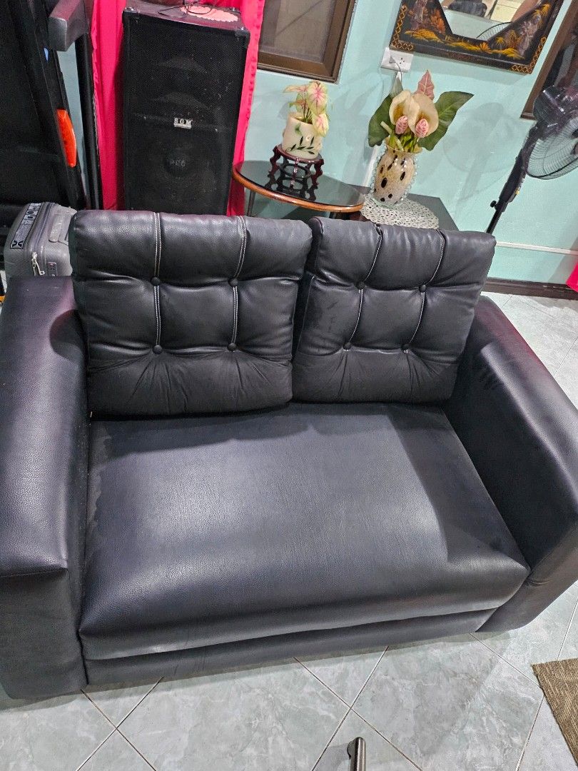 Leather couch sofa (Category: Sofas) located in Pasig City. Submitted by periwinklepeach (Listing ID 1309451857, Image 2). Description: very good condition no flaw with cushion.