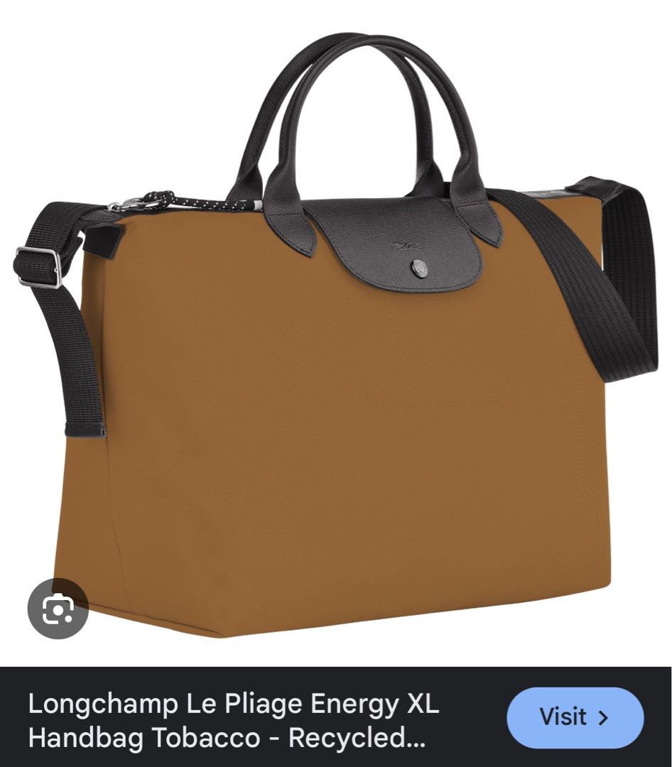 longchamp tobacco bag Xtra round shoulder The interior boasts 1 zipped pocket and 1 flat pocket Bought and cleaned up this