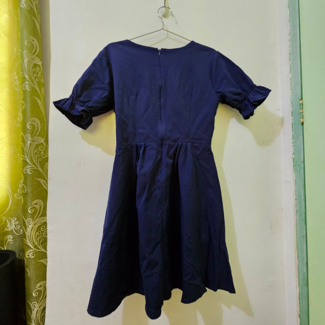 Navy Blue Dress (Category: Dresses) located in Cavite. Submitted by jmstuff__ (Listing ID 1309390798, Image 3). Description: READ ‼️‼️‼️ Brand: Hey, Riley (local brand ♡) Material: Cotton Twill Blend (makapal to swear!) Size: Medium - for more details, please refer to 10th slide (last slide) ‼️ Other Details: 👉 originally P1,299 👉 used 2x only 👉 with white markings due to storage (refer to 7th slide) 👉 bought from 🟠 app.