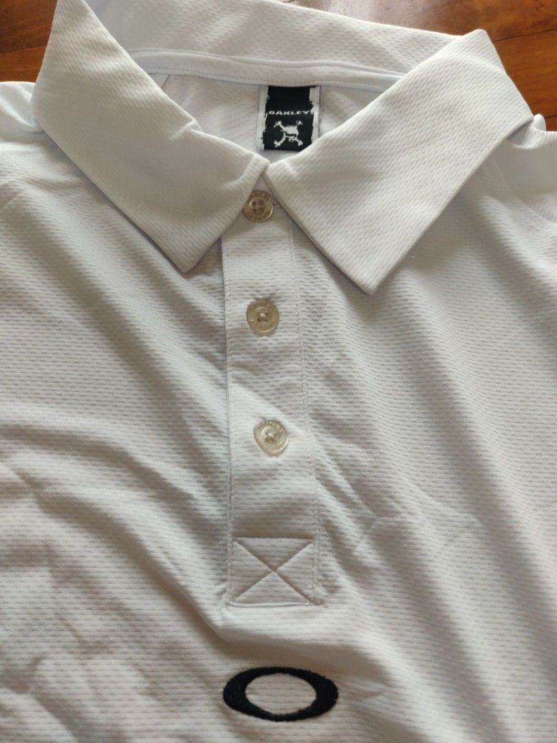 OAKLEY POLO TEES UNISEX FOR SALE Men s Fashion Tops Sets Tshirts Polo Shirts on Carousell