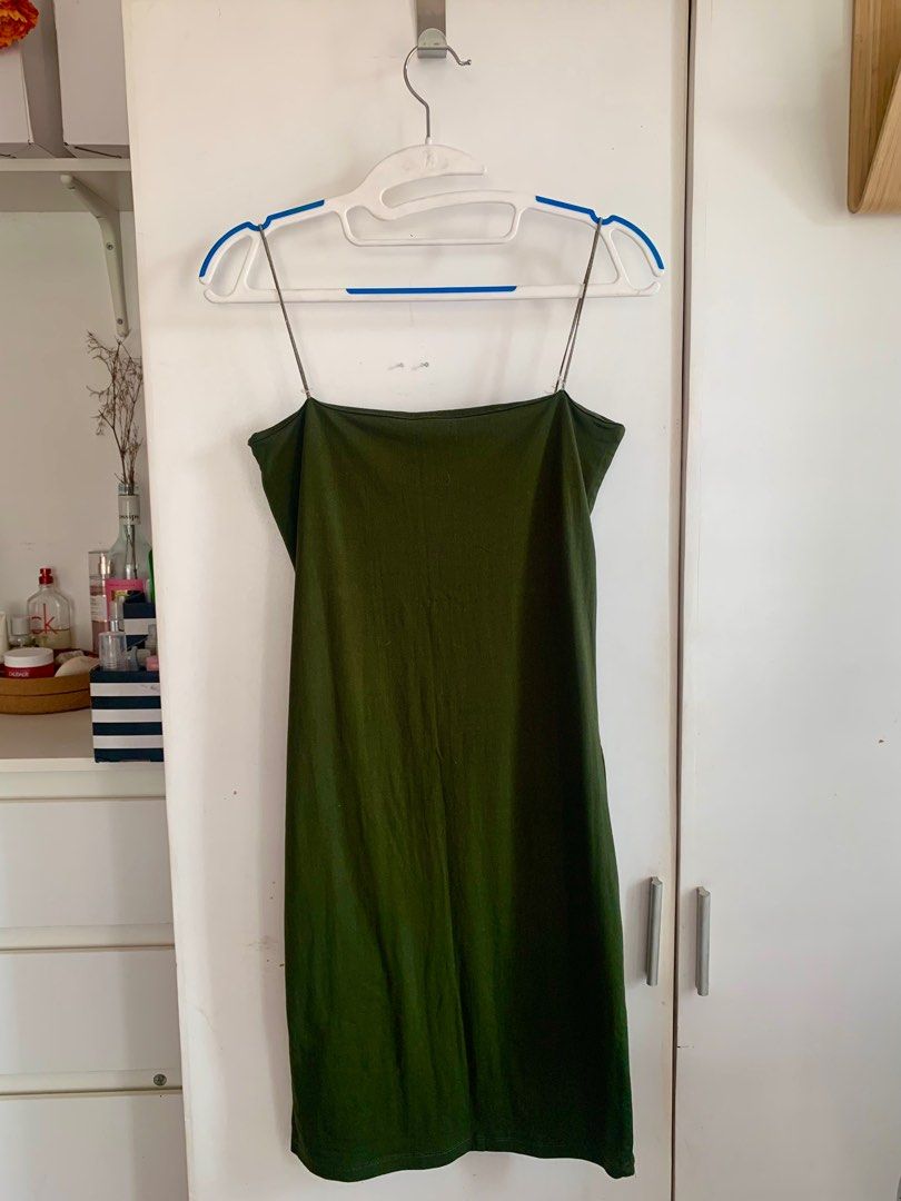Olive Green Bodycon Dress (Category: Dresses) located in Marikina City. Submitted by declutterbymilkee (Listing ID 1309460793, Image 2). Description: Olive Green Bodycon Dress - never worn - perfect condition, no flaws - very flattering!! ✨ - perfect this summer - best fits S-M SF not yet included. GCash/ Maya/ BDO Ref. #23.