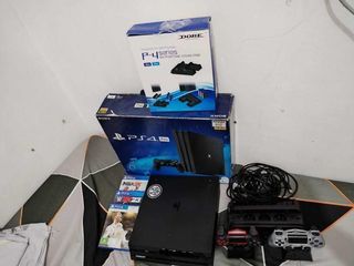PS4 Pro 1TB Color: JET BLACK  Comes with: PS4 Pro 1TB 2 Controller Charging Cable Power Cord HDMI With Cooling Stand  With FREE 3 PS4 GAMES