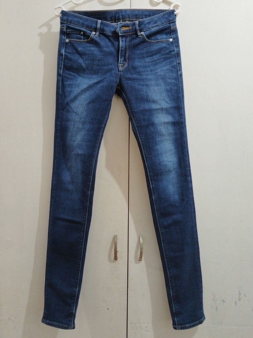 Uniqlo Skinny Denim (Category: Jeans) located in Cainta. Submitted by Second.life (Listing ID 1309444866, Image 1). Description: Uniqlo Skinny Dark Blue shade of denim. Not hard denim. Not faded. Not High rise. swipe for waist measurement. Looks very new since I forgot that I have this..