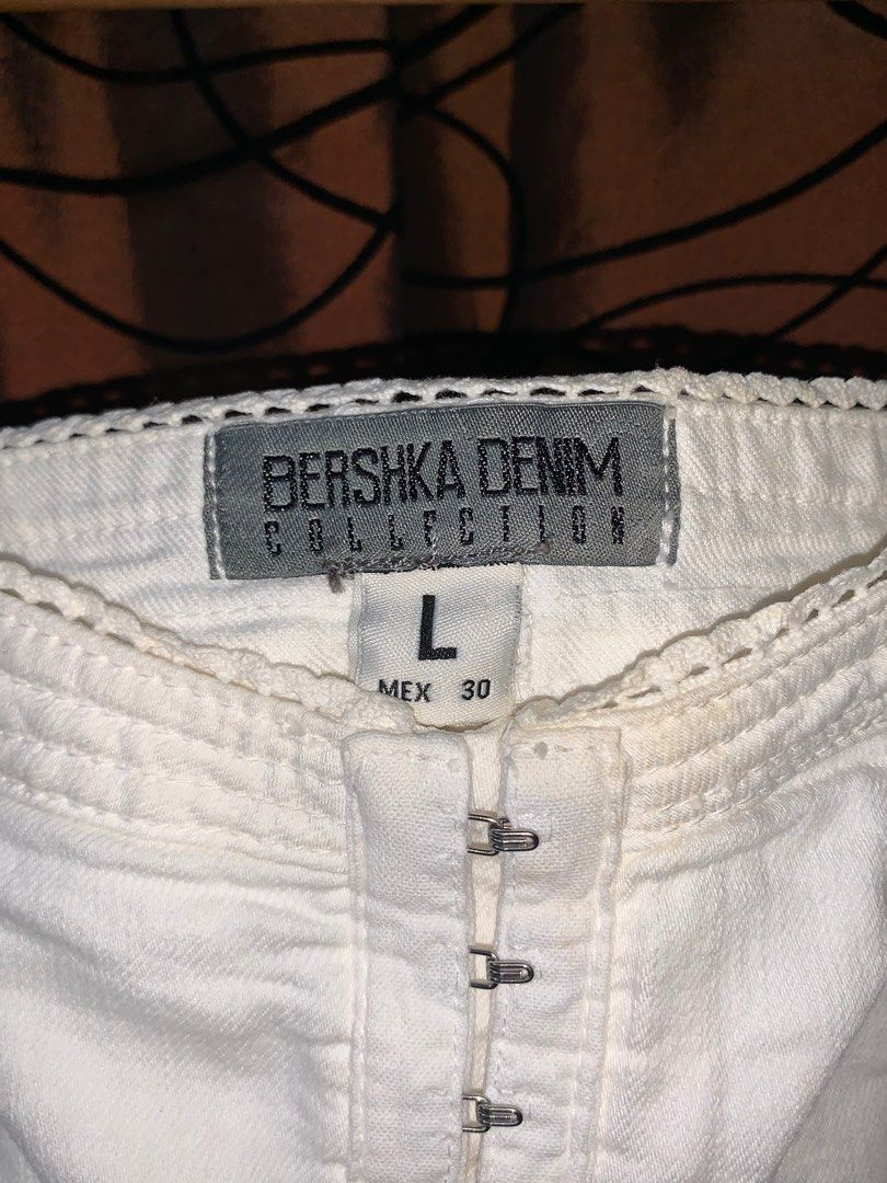 Bershka White Denim Dress (Category: Dresses) located in Mandaluyong City. Submitted by elayg (Listing ID 1309689089, Image 2). Description: See photos for the light discoloration Large on size but best fit small to medium 26.5 Length.