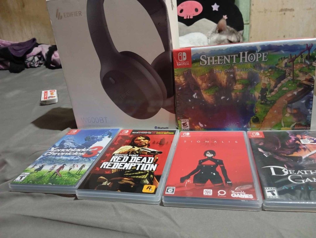 Nintendo Switch Games, Silent Hope Day One, Amiibo (Category: Nintendo) located in Manila. Submitted by aiconnn (Listing ID 1309655050, Image 1). Description: For Sale Only If you get three or more items, you'll get free transparent joycon shells Silent Hope Day One Edition (Brand New & Sealed) - P3,000 Red Dead Redemption - P1,700 Xenoblade Chronicles 3 - P1,600 Signalis (Rare physical copy) - P1500 Death's Gambit Afterlife (Brand New & Sealed w
