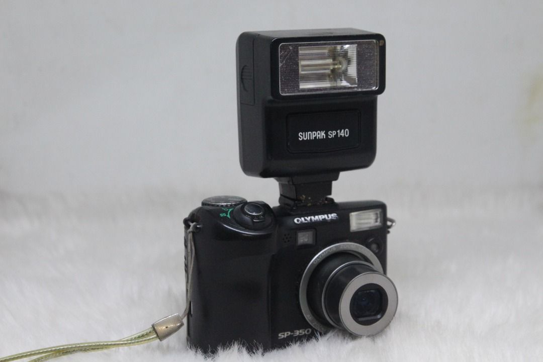 OLYMPUS SP-350 CCD sensor 3x Optical Zoom (Black) (Category: Cameras) located in Manila. Submitted by ultimogizmos (Listing ID 1309664951, Image 2). Description: OLYMPUS SP-350 8MP Digital Camera with 3x Optical Zoom (Black) About this item 8.0-megapixel CCD captures enough detail for photo-quality 16 x 22-inch prints 3x optical zoom; 2.5-inch LCD display Add optional conversion lenses to the camera's threaded barrels (not included); hot shoe att