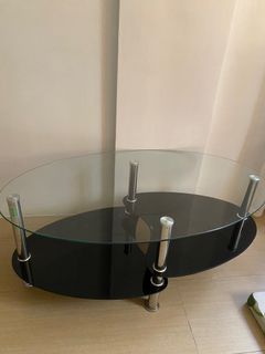 Oval glass/black center table