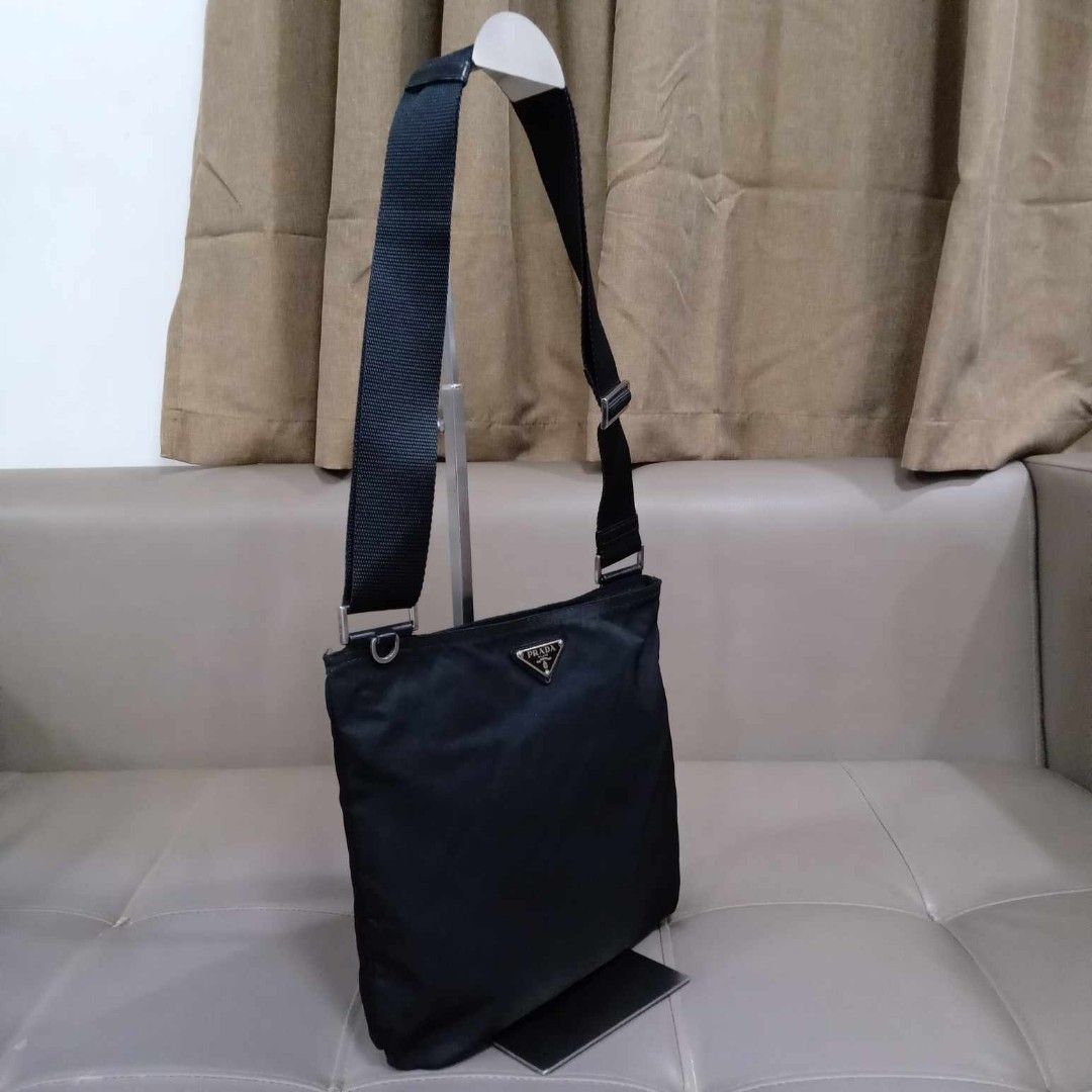 Prada Black Nylon Sling Bag (Category: Luxury Bags & Wallets) located in Taguig. Submitted by esa.agustin (Listing ID 1309586868, Image 3). Description: Original Prada black nylon sling bag. Made in Italy..