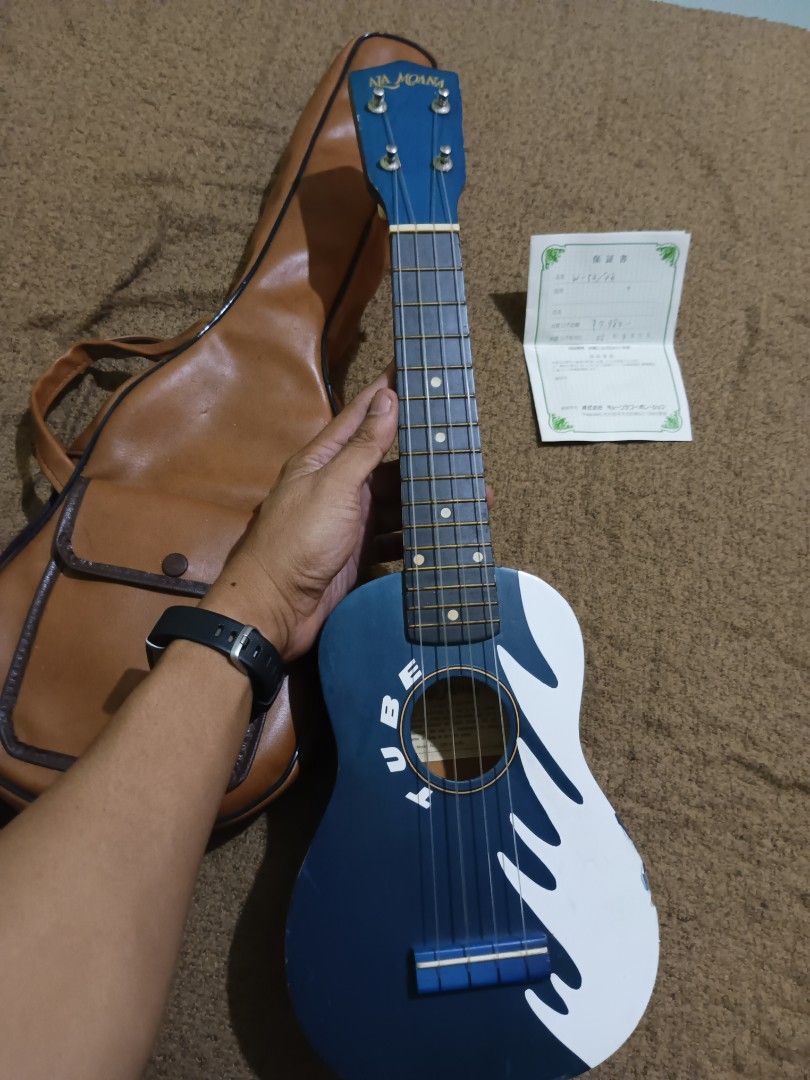 Aja Moana quality ukulele with soft leather case (Category: Musical Instruments) located in Quezon City. Submitted by markgolveo (Listing ID 1306545627, Image 3). Description: Aja Moana quality ukulele with soft leather case.