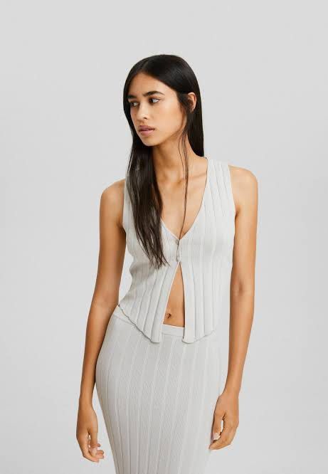 Bershka Grey knitted vest (Category: Blouses) located in Makati City. Submitted by truthfairy (Listing ID 1306699733, Image 1). Description: Bershka knitted vest Small on tag but may also fit Xs New condition, haven’t been used.