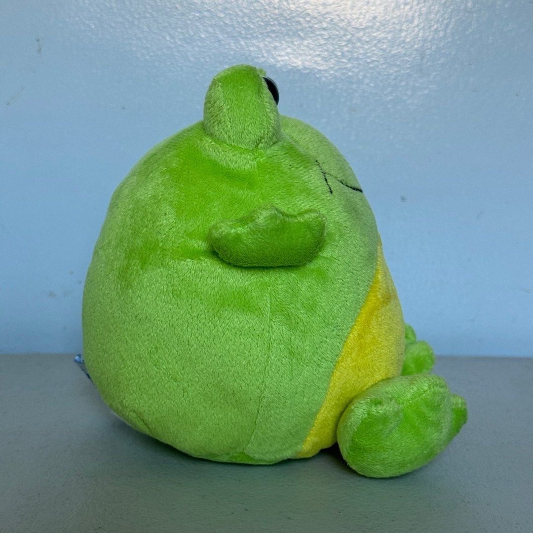 Blue Magic Frog Plushie Toy (Category: Plushies & Soft Toys) located in Binan City. Submitted by aeiryse (Listing ID 1306581685, Image 3). Description: Plastic container has signs of yellowing but the plushie itself can act as new. Also, frogie has a name. His name was Clifford..