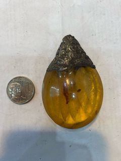 Broken pendant amber