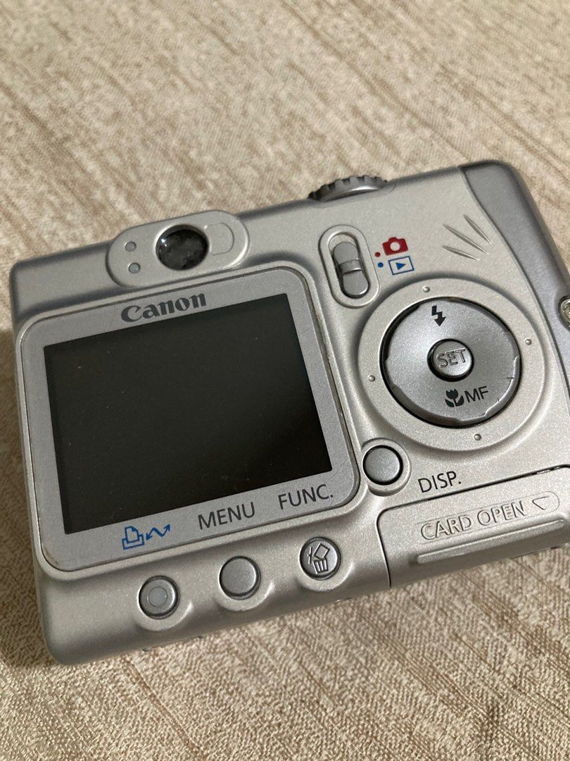 Canon Digicam (Category: Cameras) located in Cagayan de Oro. Submitted by kaeo44 (Listing ID 1306585441, Image 2). Description: Canon Digicam vintage. No charger, batteries and memory card. Selling low because I’m not sure if it is still working since the battery and charger got misplaced. .
