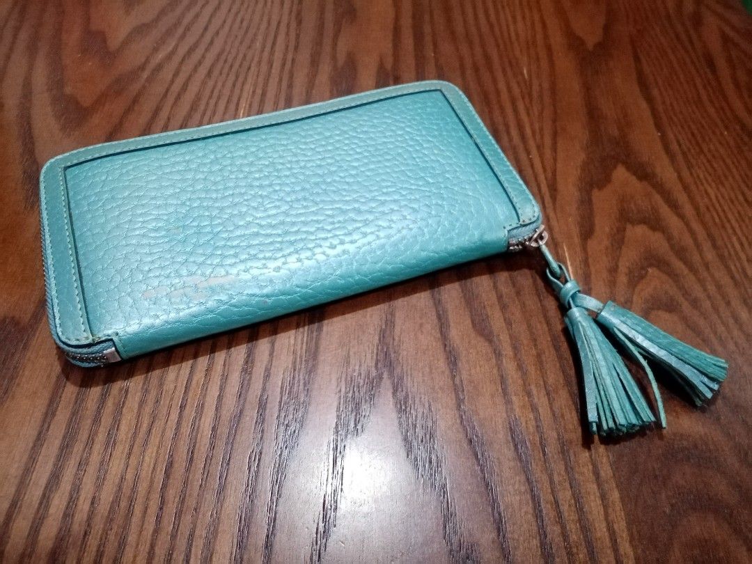 Fino Leatherware Wallet (Category: Wallets & Card holders) located in Cebu City. Submitted by maksipreloveditems (Listing ID 1306706260, Image 1). Description: With Transfer but can be cleaned Measurement: If closed: L = 8 inches W = 0.75 inches H = 4 inches.