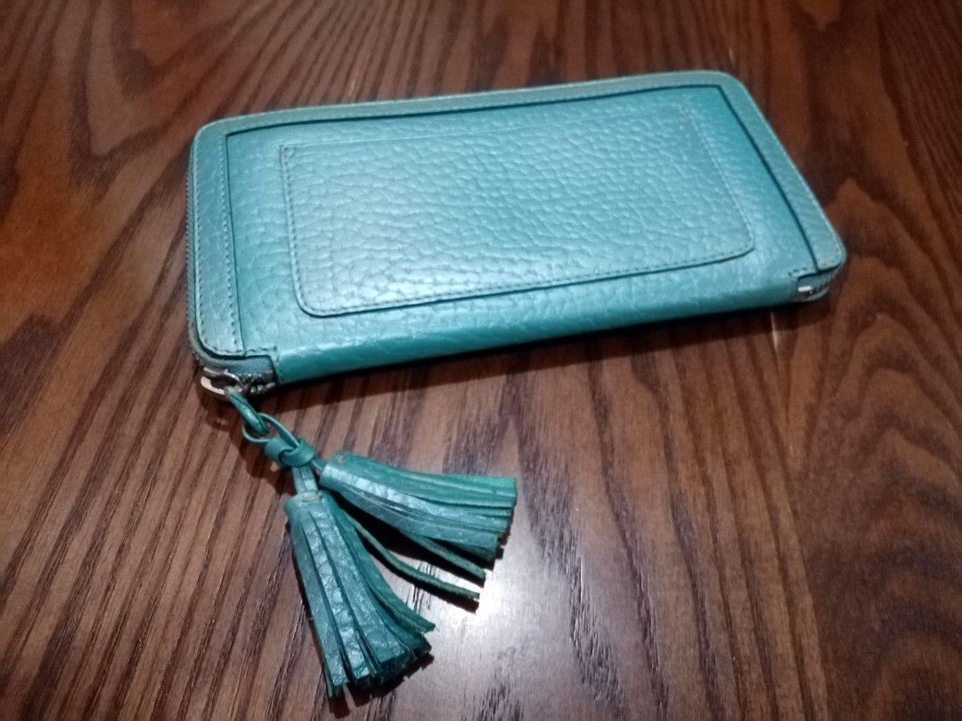 Fino Leatherware Wallet (Category: Wallets & Card holders) located in Cebu City. Submitted by maksipreloveditems (Listing ID 1306706260, Image 2). Description: With Transfer but can be cleaned Measurement: If closed: L = 8 inches W = 0.75 inches H = 4 inches.