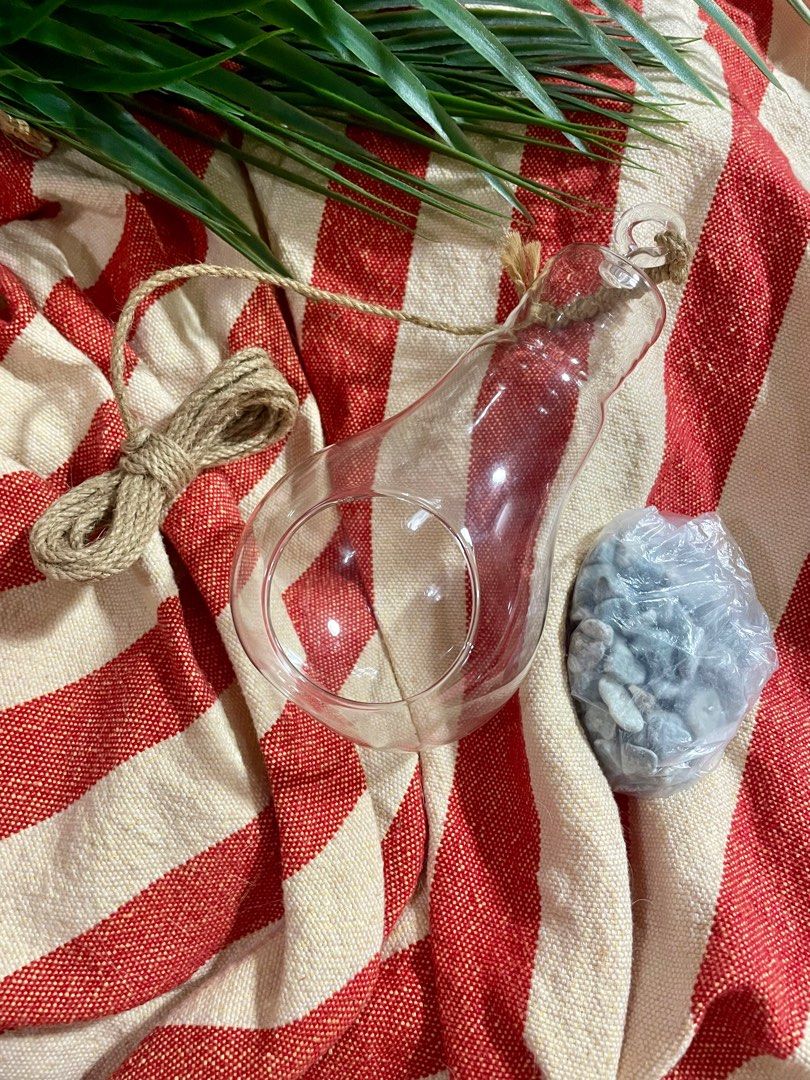 Light bulb glass container for airplants (Category: Gardening Tools & Ornaments) located in Paranaque City. Submitted by cngaya (Listing ID 1306613649, Image 1). Description: New and never used. I was thinking of growing airplants, but i have a nack for growing cacti. Comes with natural rope to hang the piece and gravel to add to the beauty of the whole look. Feel free to message for questions and photos. Please take into account that I am not a 