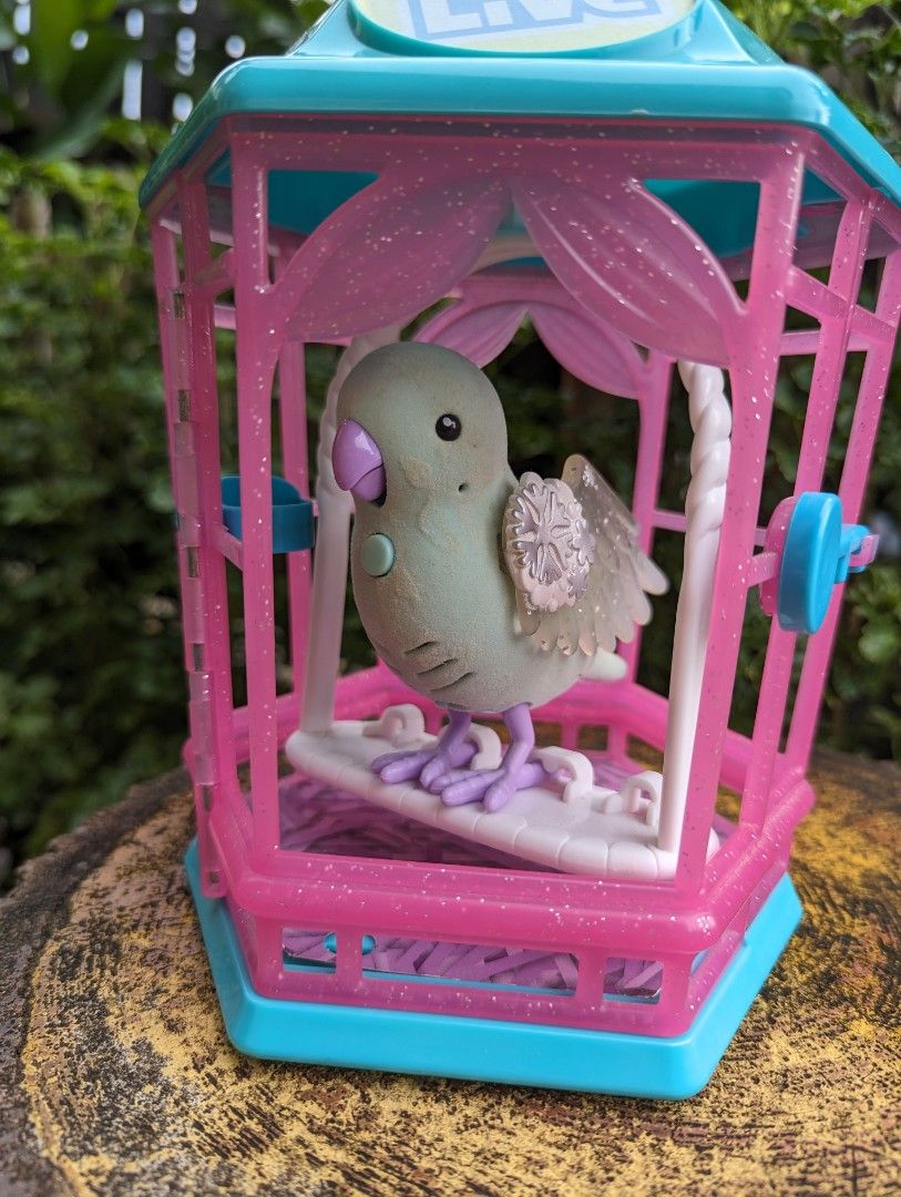 Little Live Pets Bird with Cage Rainbow Glow bird talking bird toy