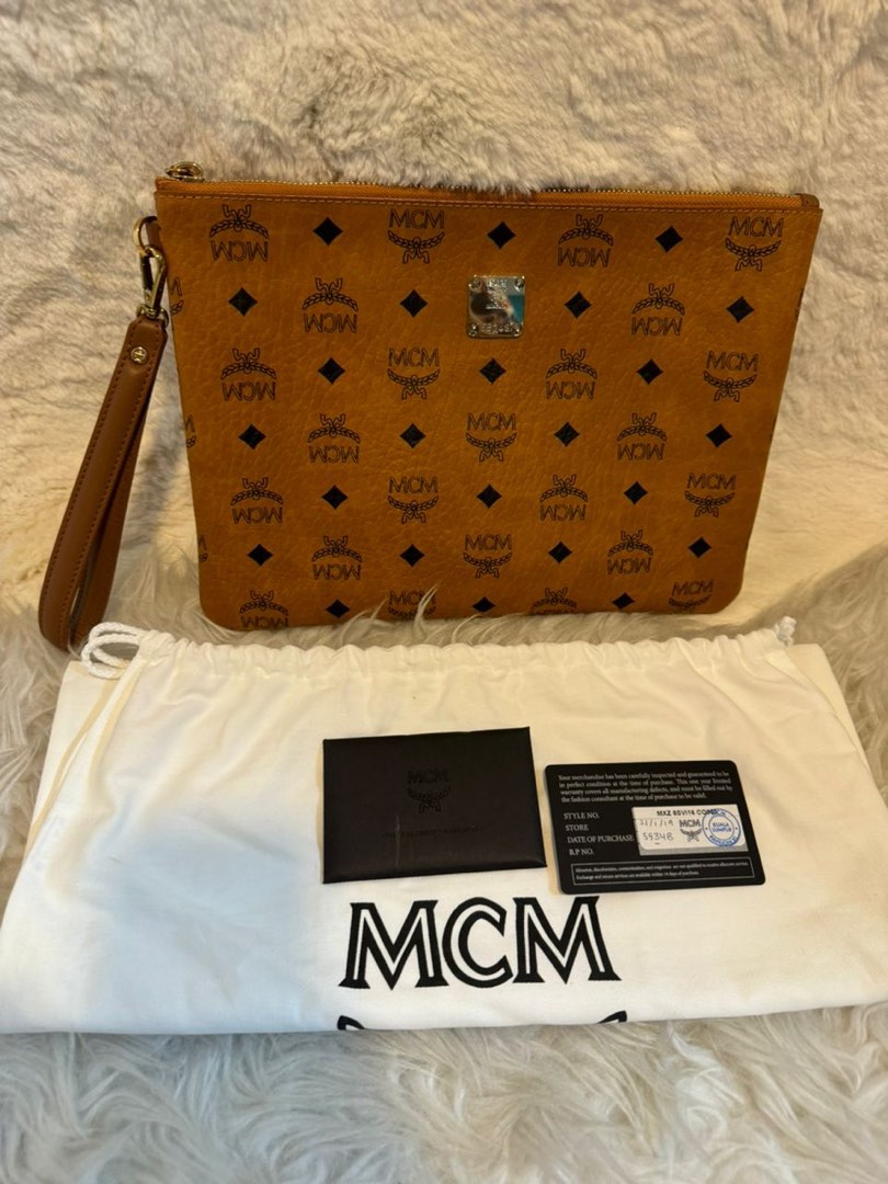 Clutch mcm bag online