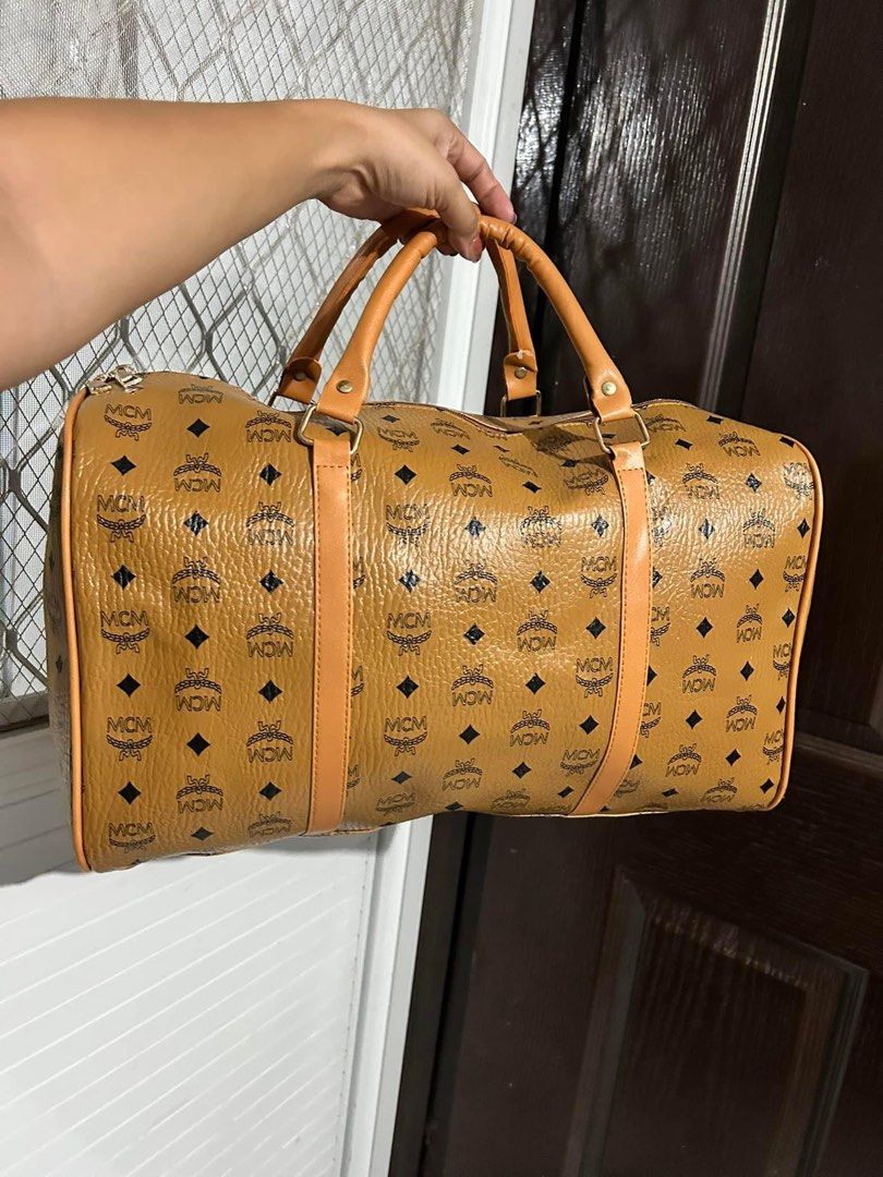 MCM Travelling Bag (Category: Luxury Bags & Wallets) located in Mandaluyong City. Submitted by preloved_purses (Listing ID 1306703134, Image 1). Description: .