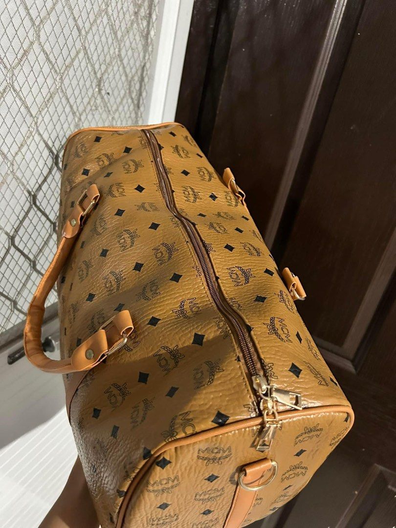 MCM Travelling Bag (Category: Luxury Bags & Wallets) located in Mandaluyong City. Submitted by preloved_purses (Listing ID 1306703134, Image 2). Description: .