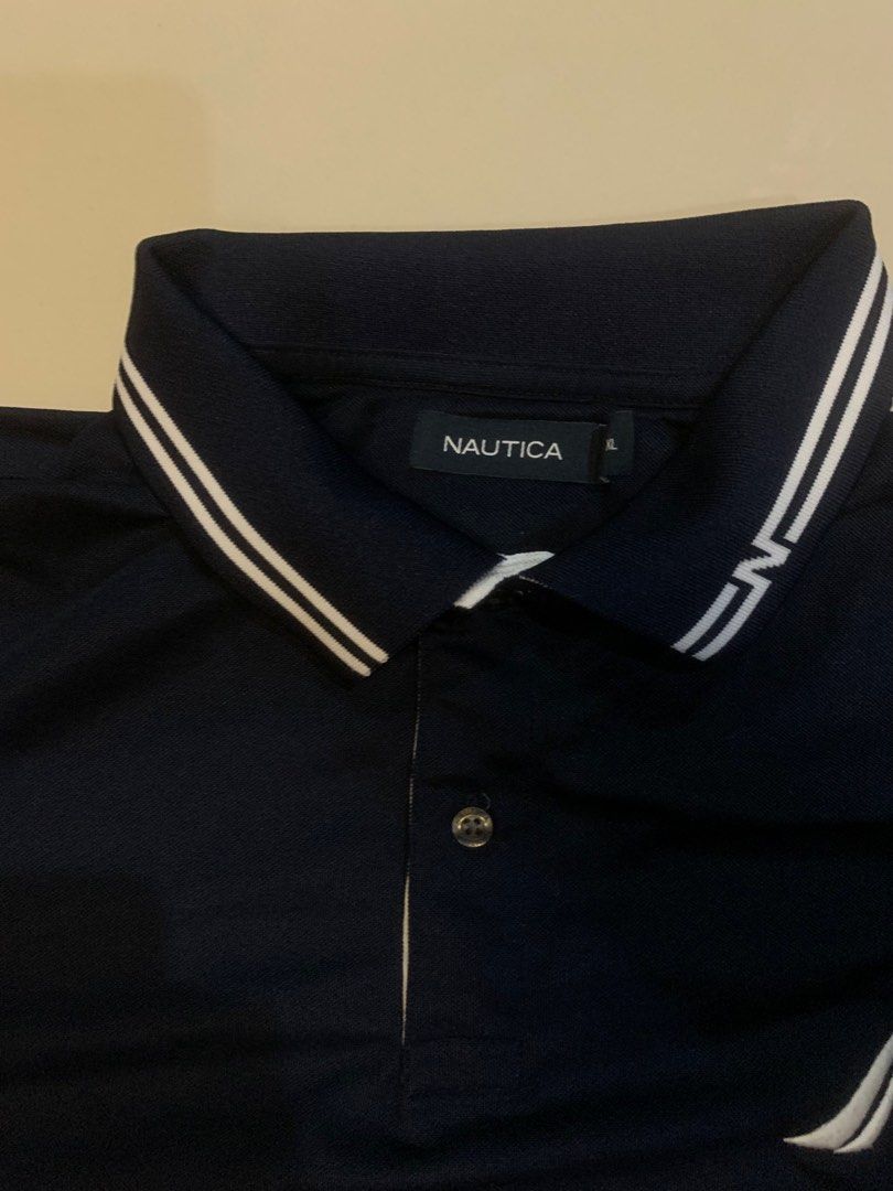 Nautica polo shirt (Category: Tshirts & Polo Shirts ) located in Quezon City. Submitted by freeman520 (Listing ID 1306703631, Image 3). Description: Nautica Polo shirt Size XL Theres a written name inside collar but not noticeable when worn since you’ll fold it. .