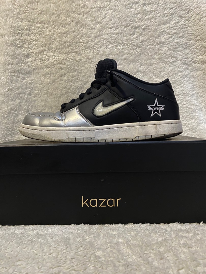 Supreme x nike sb dunk low metallic silver top