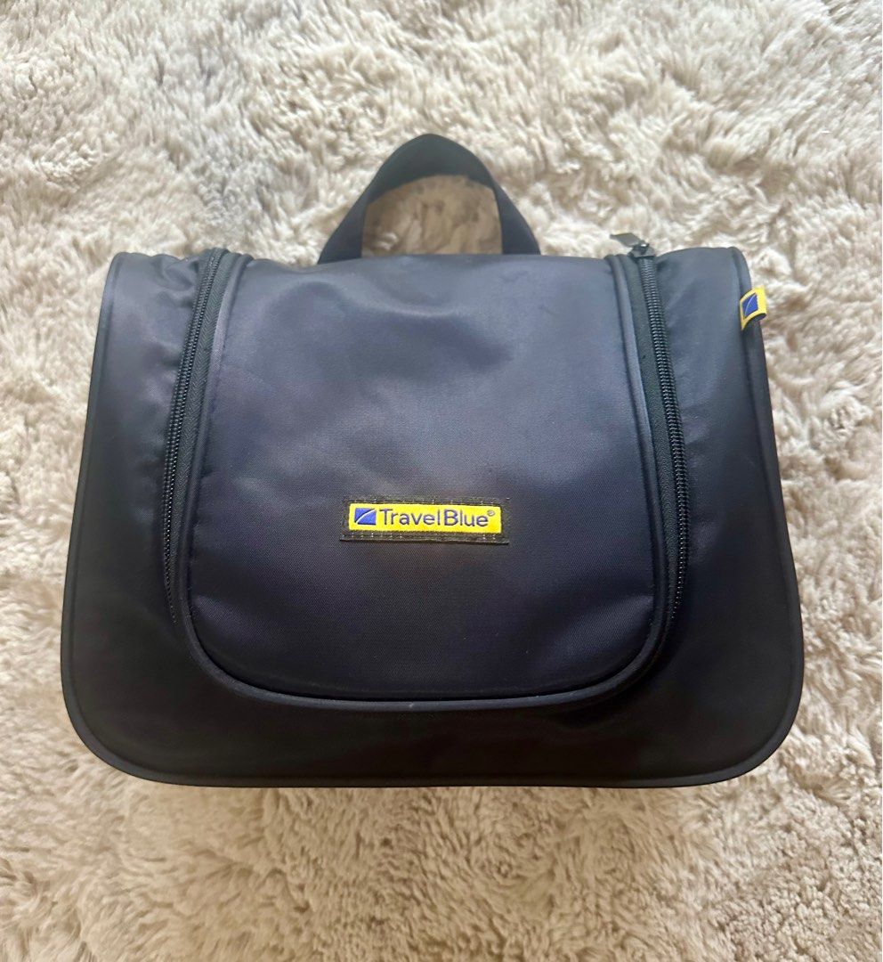Travel Blue Toiletry Bag (Category: Bath) located in Cavite. Submitted by mjoy0302md (Listing ID 1306556276, Image 1). Description: Travel Blue Toiletry Kit Color: Black Used once only Almost brand new With zipped compartment and mesh pockets With metal hook to hang the bag up Dimensions: 22cm x 11cm x 26cm .