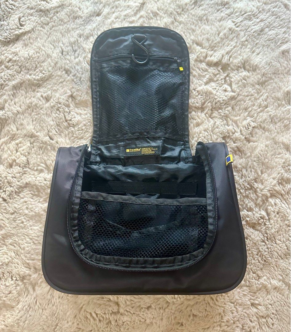 Travel Blue Toiletry Bag (Category: Bath) located in Cavite. Submitted by mjoy0302md (Listing ID 1306556276, Image 2). Description: Travel Blue Toiletry Kit Color: Black Used once only Almost brand new With zipped compartment and mesh pockets With metal hook to hang the bag up Dimensions: 22cm x 11cm x 26cm .