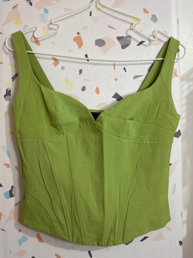 Zara green boned corset top (Category: Blouses) located in Makati City. Submitted by truthfairy (Listing ID 1306701107, Image 1). Description: Still like new condition used once not faded has a working side zipper flattering sweet heart neckline Love this one but ut doesn’t fit me anymore.