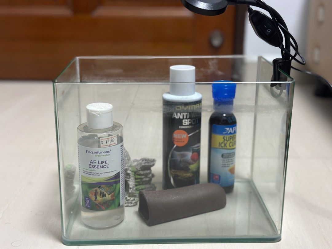 Assorted Fishkeeping items (Category: Homes & Other Pet Accessories) located in Singapore. Submitted by satay176 (Listing ID 1309763224, Image 1). Description: Selling the following items - Anti white spot treatment (90% full) - Super Ick Cure (Sealed and unopened) - Life essence (beneficial bacteria 80% full) - Cave and pleco hiding accessories - LED light - Mini BIO ring - Activated carbon - Aquatic soil Drop me a text to check with the price. 