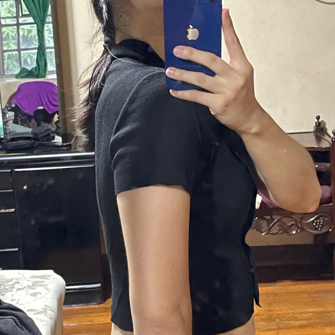 Black Button Down Top (Category: Blouses) located in Pasig City. Submitted by _mari (Listing ID 1309819434, Image 3). Description: Im a medium sized woman hehe Stretchable Last price.