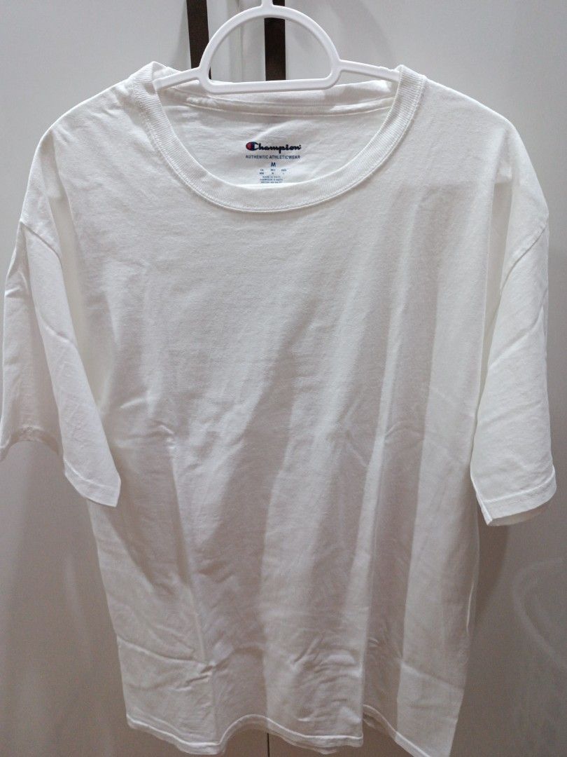Champion cotton tshirt (Category: Tshirts & Polo Shirts ) located in Manila. Submitted by unboxing_addict (Listing ID 1309813437, Image 2). Description: champion authentic athleticwear medium on tag large for women can fit also nice quality cotton (not manipis) pwede pang alis (not see thru) very white pa.