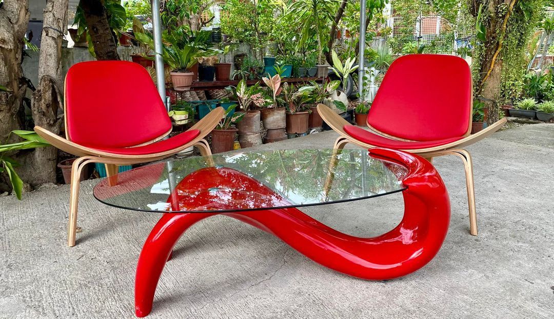 Hans Wegner Style Shell Chair & Mermaid Coffee Table (Category: Other Home Furniture) located in Cebu City. Submitted by bellababystuffcebu (Listing ID 1309861778, Image 1). Description: Hans Wegner Style Shell Chair & Mermaid Coffee Table Selling as set . All in excellent conditions Ergonomic chair super comfy!.