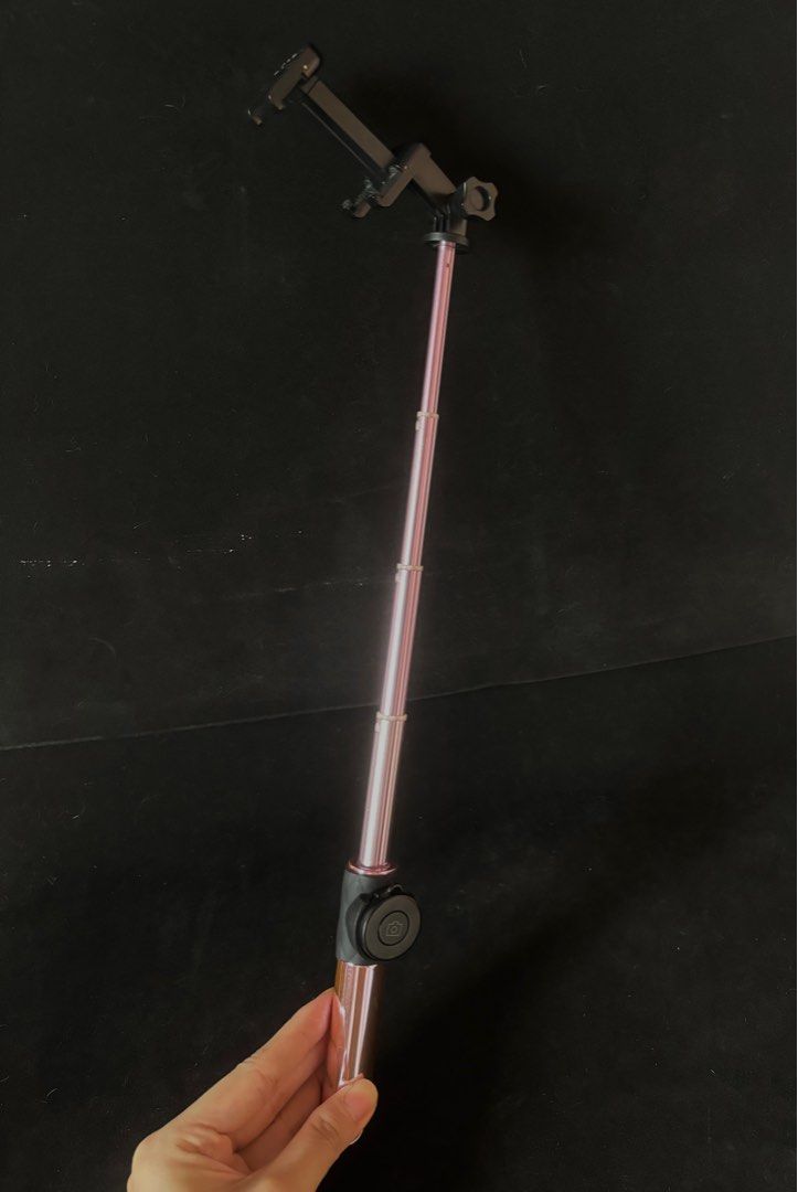 HQ Selfie Stick in Metallic Pink (Category: Mounts & Holders) located in Manila. Submitted by shop_sarisari (Listing ID 1309767031, Image 2). Description: bought in japan. not sure if bluetooth is still working. needs CR2032 lithium battery. measurements: folded: 5” extended: 16.5” phone holder: 2” - 3.25” MOP: GCash or BPI bank transfer only..