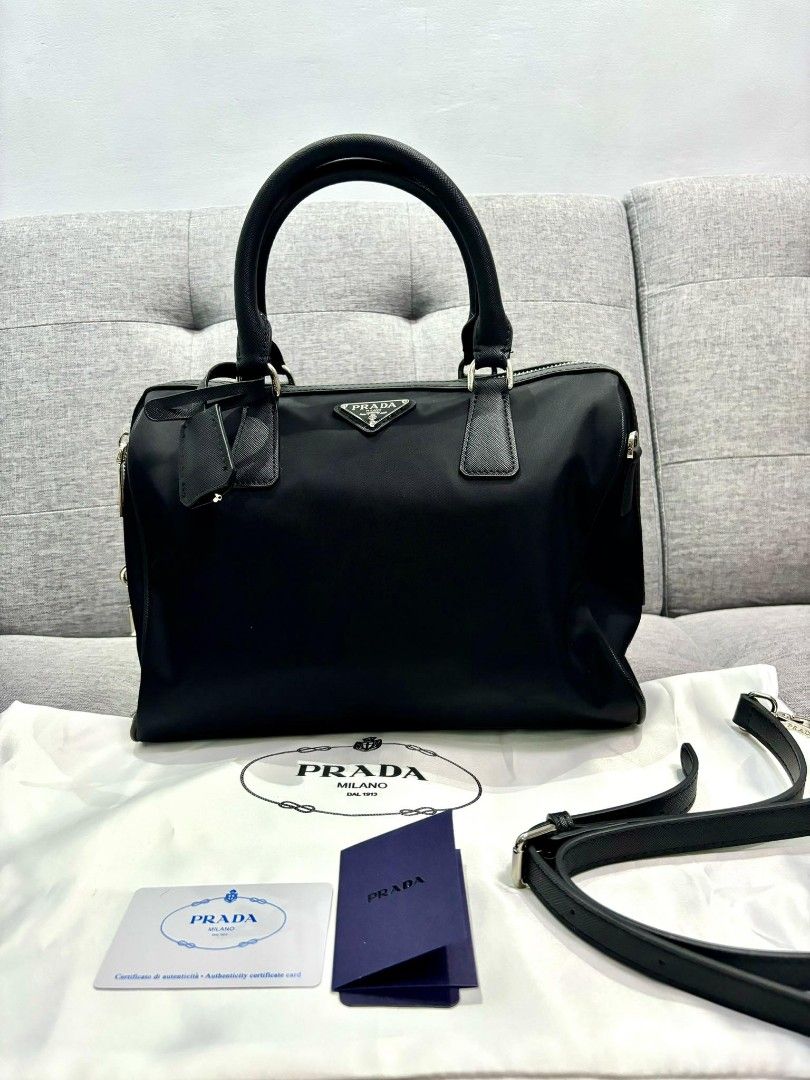Prada Boston 30 cm (Category: Luxury Bags & Wallets) located in Cebu City. Submitted by day.98 (Listing ID 1309790251, Image 1). Description: japan preloved nailon leather lampo zipper coded , etikita no flaws.