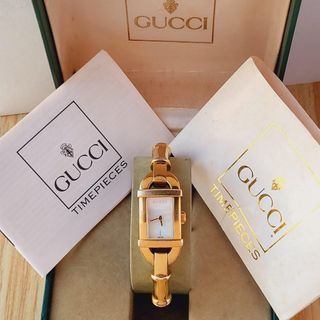 Preowned GUCCI Bamboo 6800L Mother of Pearl Dial Bangle Gold Watch
